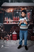 shooting-magique-photographe-noel-avec-famille-et-enfant-dans-la-neige